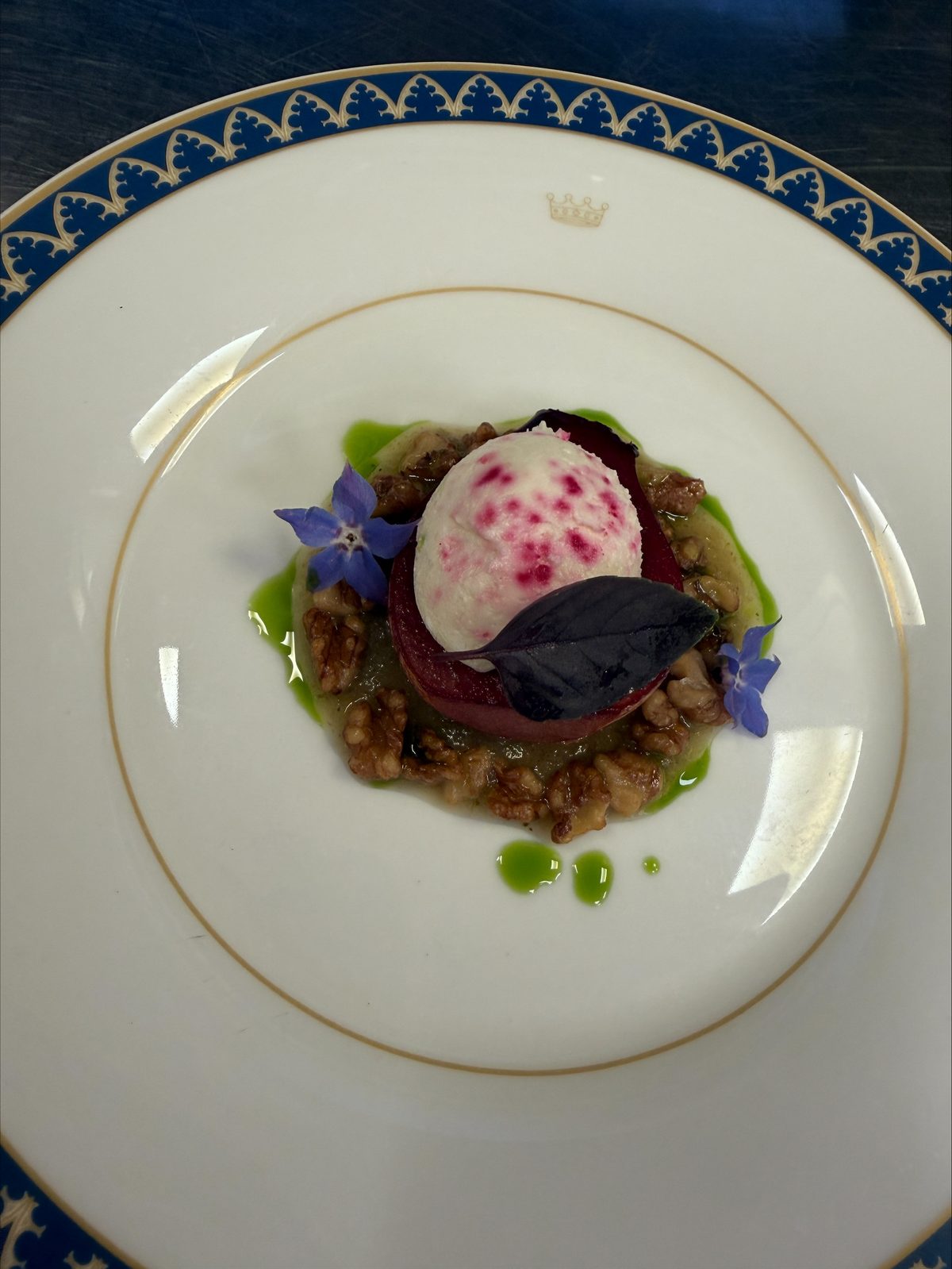 Smoked St Tola goat's cheese ice cream with merlot poached pear